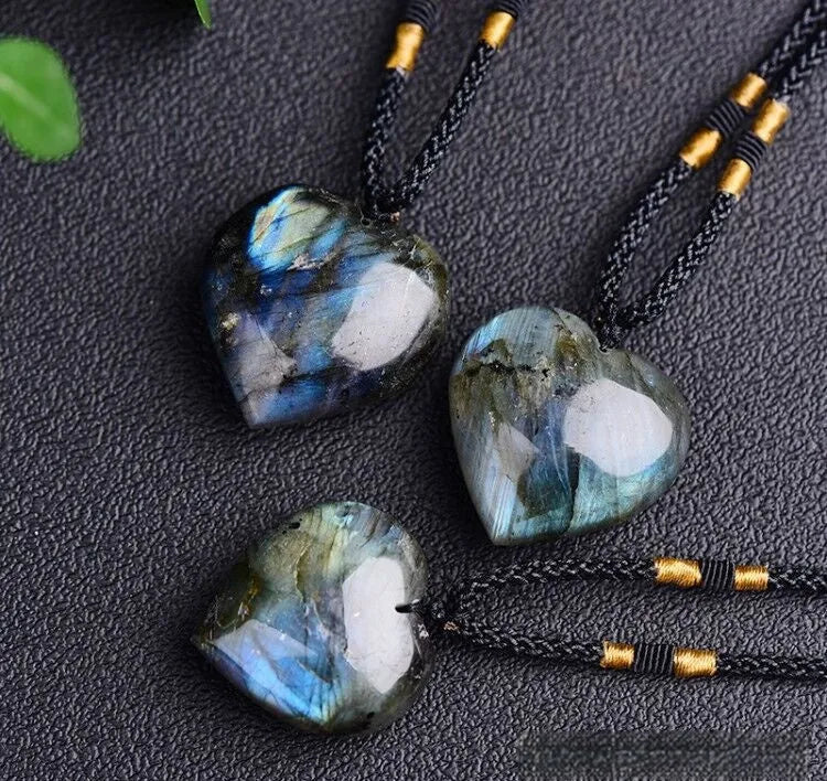 Blue light labradorite moonstone Heart of the Ocean geometric crystal necklace on a chain.