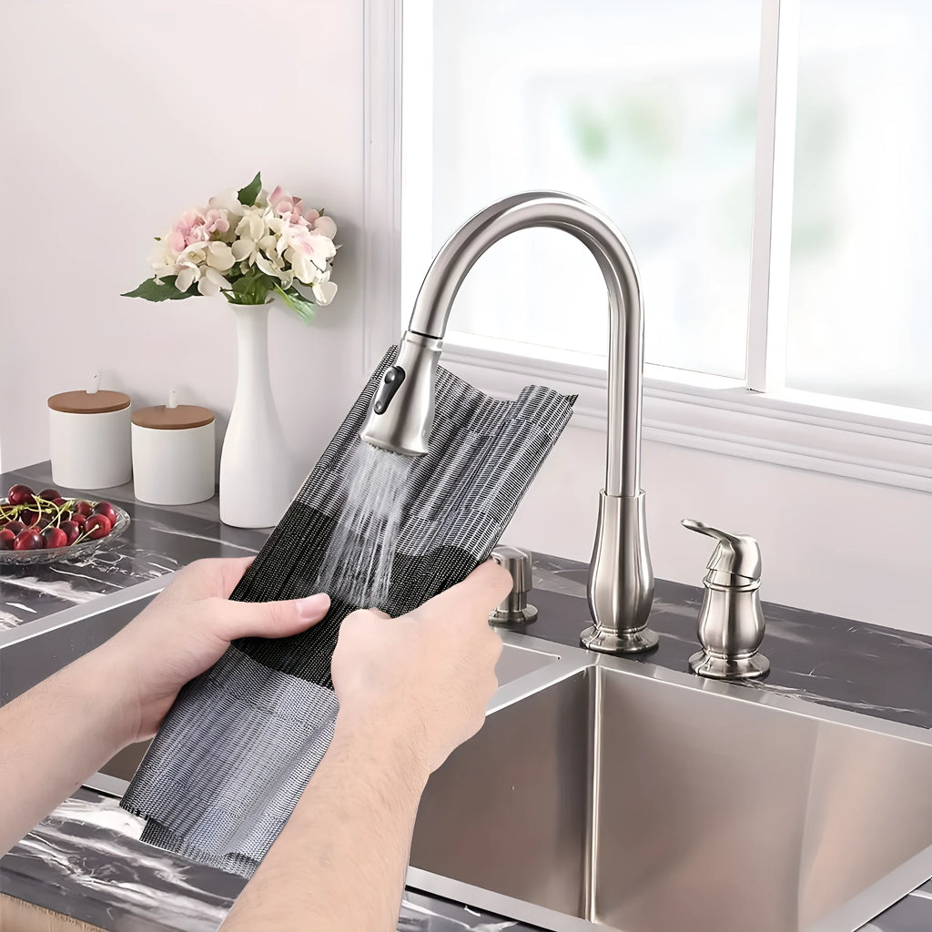 PVC non-slip dish mat in gradient bamboo black colour on a kitchen countertop.