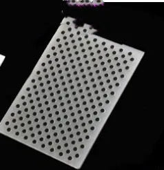 Plastic cake decorating mould with windmill design measuring 14.5 by 10.5 centimetres