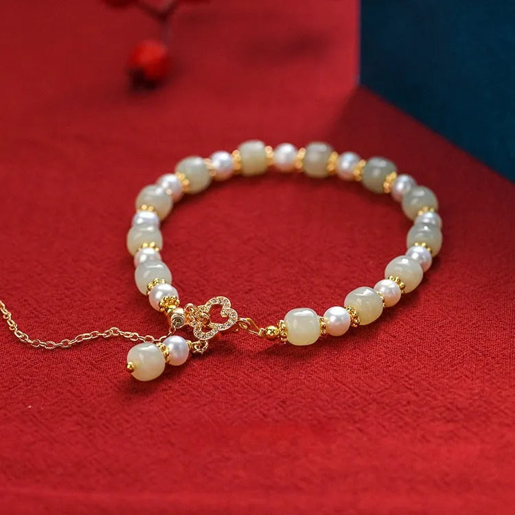 Natural Hetian Jade women's bracelet with pearl pendant and gold electroplated Chinese style design