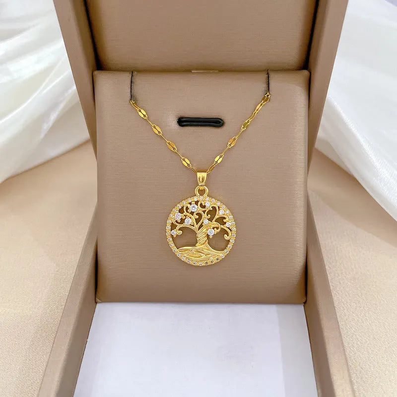 Gold-plated cross necklace with a mother pearl pendant, detailed rhinestones, and an adjustable lip chain.