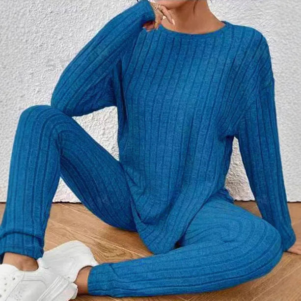 Women's sunken stripe pattern two-piece sportswear set with regular sleeve top and matching trousers