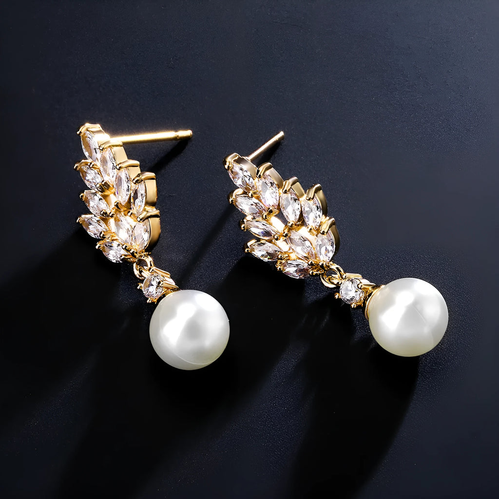 Geometric flower earrings with micro inlaid zircon stones in gold, platinum, or rose gold plating.