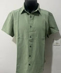 Men's solid colour short sleeve linen blend shirt on a hanger, showing loose fit.