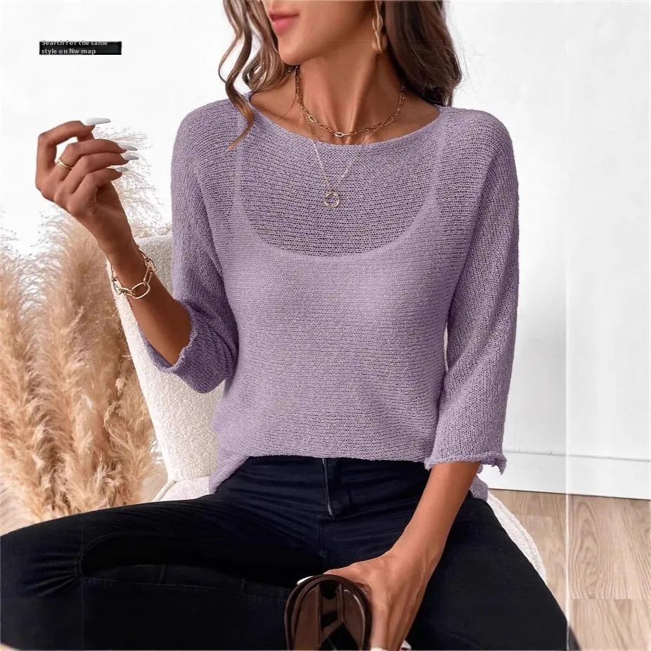 Women's thin off-shoulder knitted jumper in lavender purple with three-quarter sleeves.