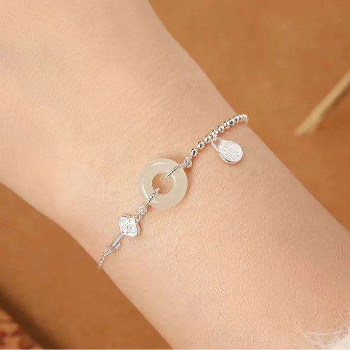 Women's 925 silver Hetian jade bracelet with Chinese geometric design and peace buckle