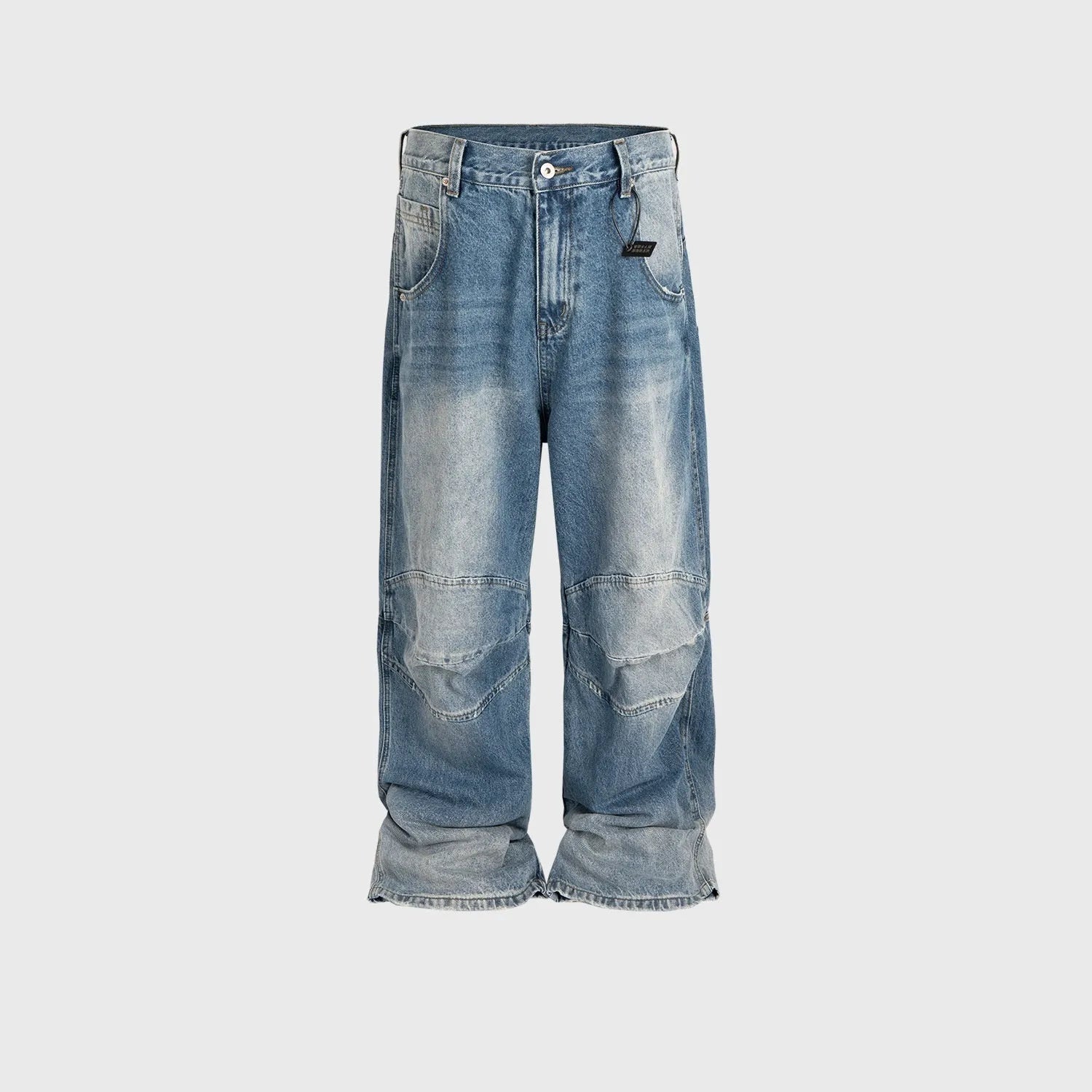 Men's light blue baggy jeans with front pleats and a straight-leg fit on a plain background.