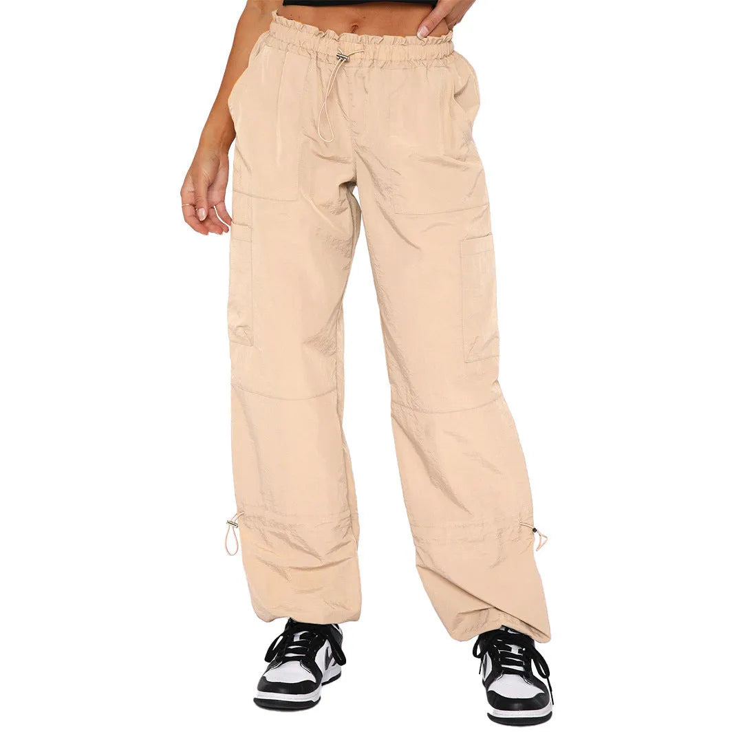 Men's loose-fit straight-leg cargo trousers with multiple utility pockets in a neutral colour.