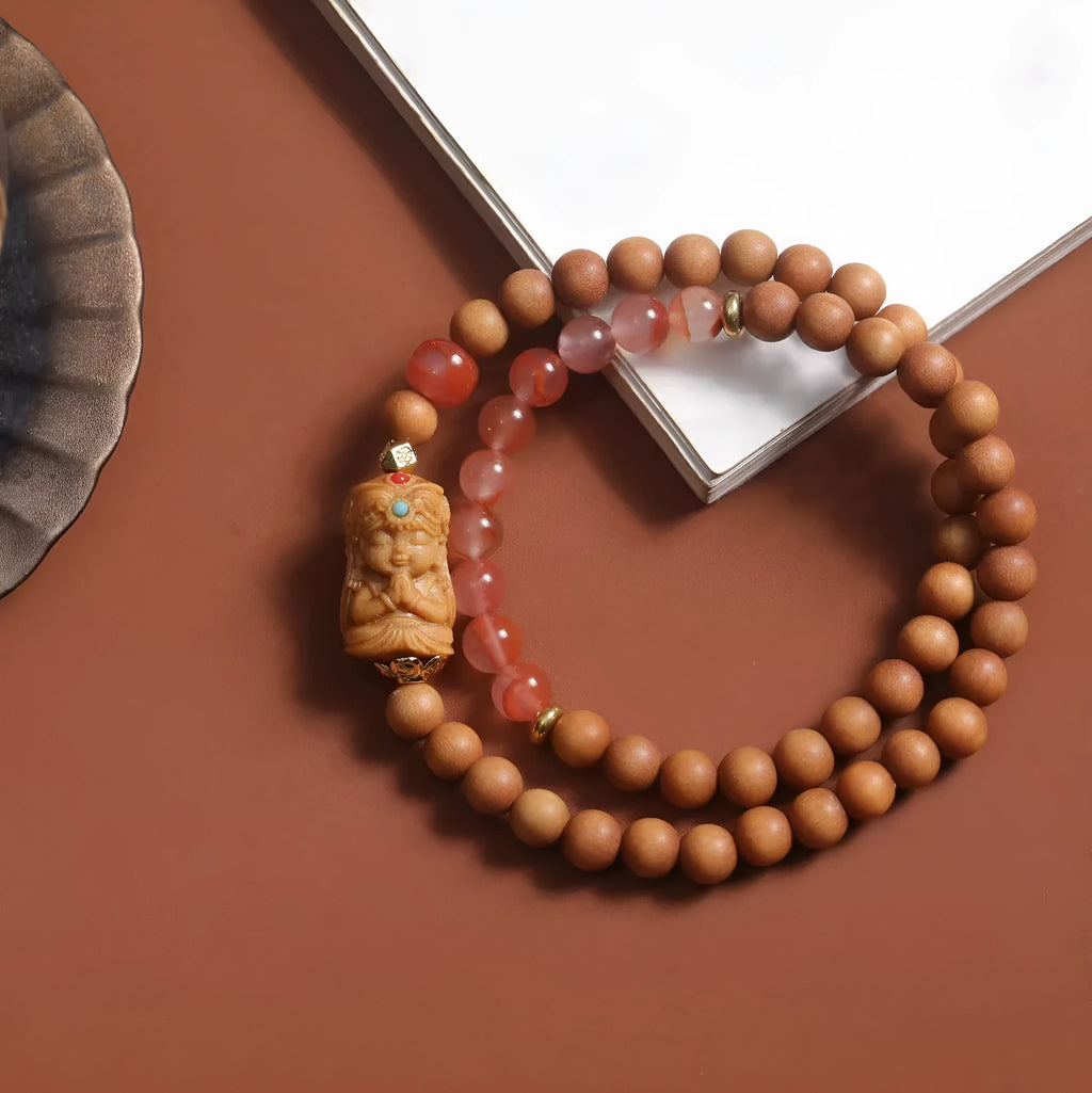 Brown wooden bracelet with sandalwood beads featuring South Red Zachilam and double circle design