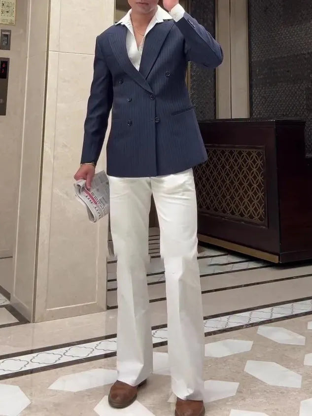 Men's striped double-breasted polyester blazer shown in regular fit for daily wear