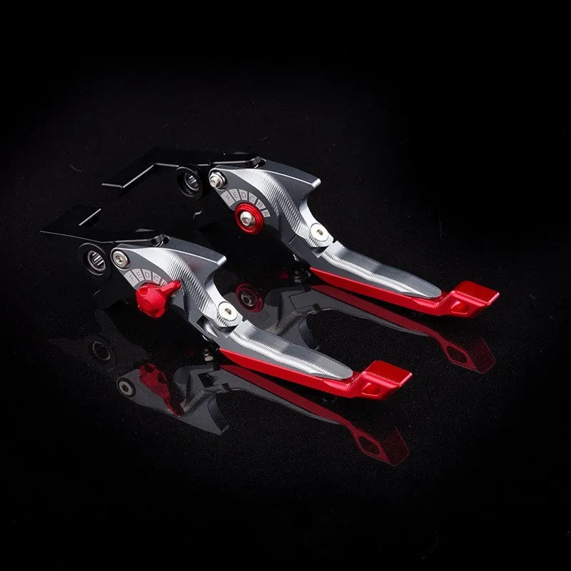 Pair of anodised aluminium motorcycle brake and clutch levers with six-speed adjustable length mechanism