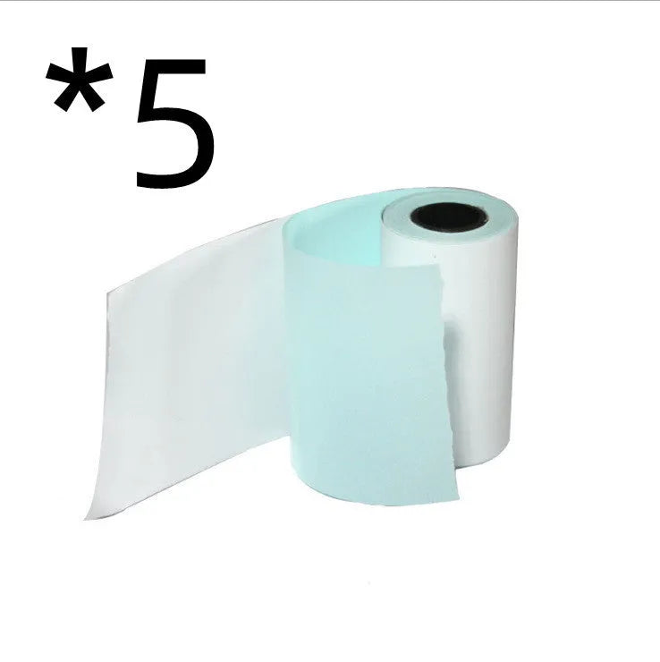 Bluetooth mini thermal photo printer in pink with USB cable and paper rolls on a white background