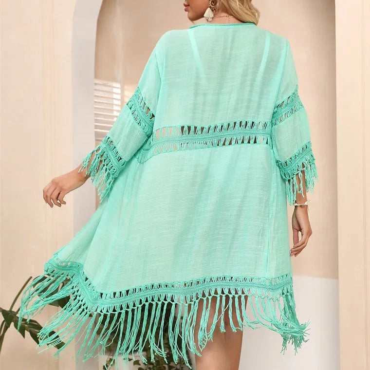 Women's hand-crocheted acrylic beach cardigan with tassel detailing in water green colour