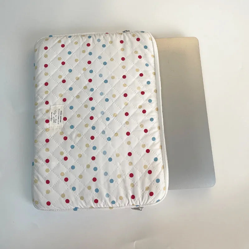 Women's polka dot polyester laptop bag shown in solid colour, suitable for 11-inch to 15.6-inch devices.