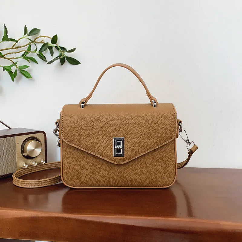 Fashion casual all-match commute cowhide portable shoulder messenger bag in PU leather with sewing thread detail