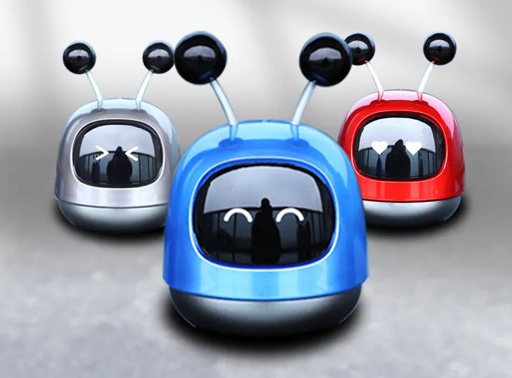 Creative robot car design car vent air freshener aromatherapy decoration in blue, grey, or red.