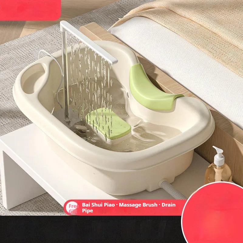 Light pink portable shampoo basin with head pillow for lying down hair washing