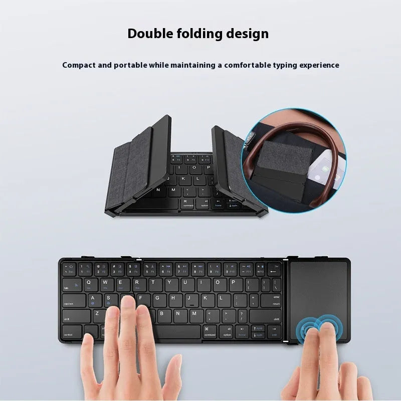 Black folding Bluetooth keyboard for mobile phones and tablets, shown next to a phone.