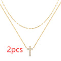 S925 sterling silver double layer twin diamond cross pendant necklace on a clavicle chain in gold colour.