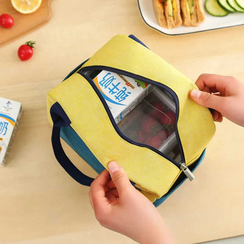 Blue waterproof oxford cloth lunch insulation bag with modern simple design.