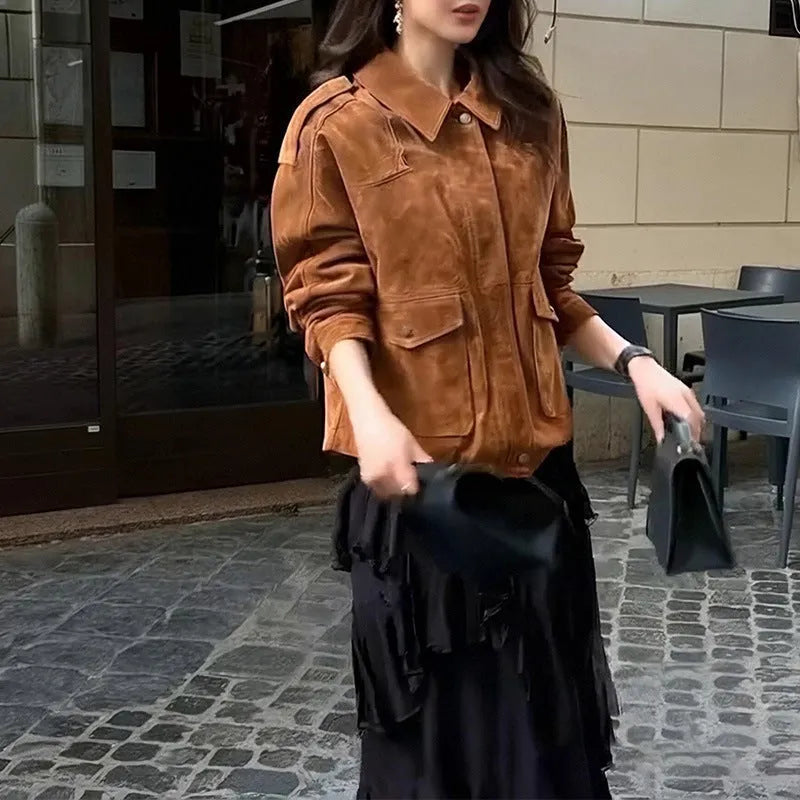 Women's bright brown suede street chic coat with button front and regular sleeves.