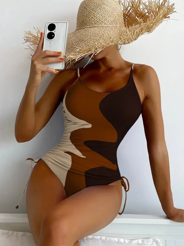 Women's sleeveless one-piece swimsuit in printed design with multiple colour options