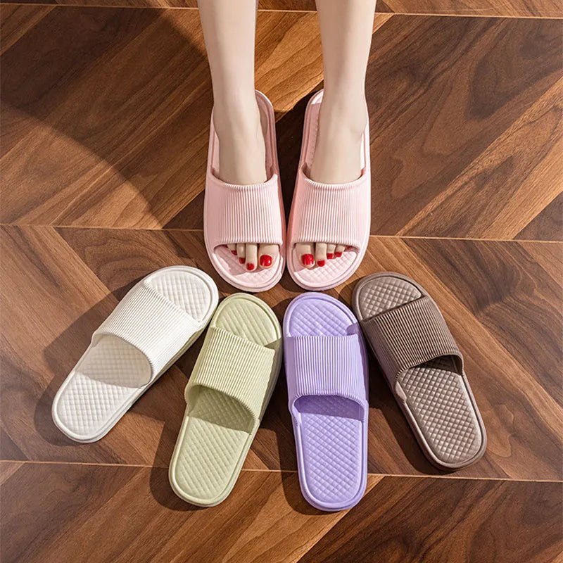 Pair of solid colour rhombus striped non-slip EVA foam indoor slippers