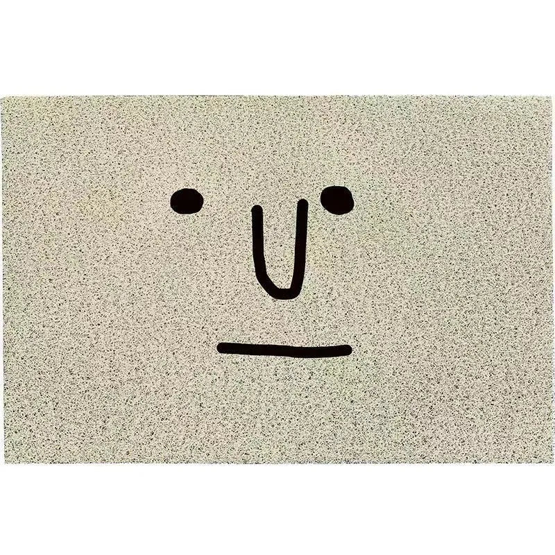 Square PVC floor mat with a geometric cartoon face Mr. Big Nose pattern in multiple size options.