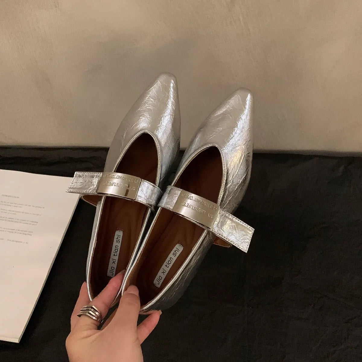 Women's silver Mary Jane shoes with pointed toe and buckle fastening in black or wine red