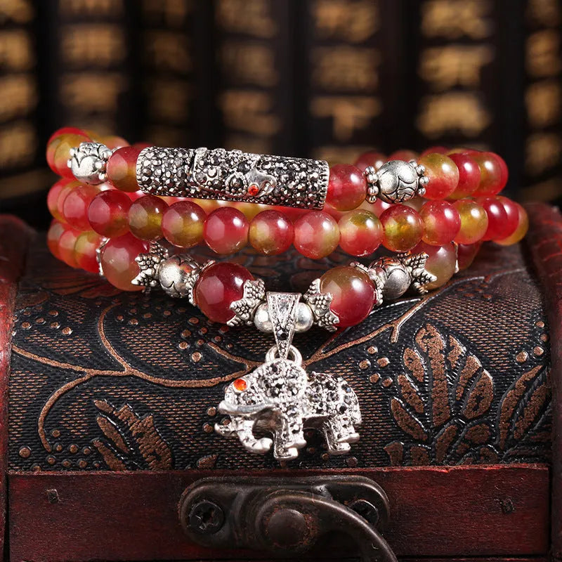 Handmade natural watermelon crystal bracelet with Chinese knot design and geometric beads in elephant style colours