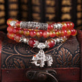 Handmade natural watermelon crystal bracelet with Chinese knot design and geometric beads in elephant style colours