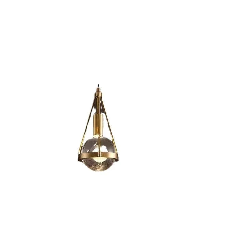 Modern copper and crystal chandelier with multiple light heads in a minimalist design.