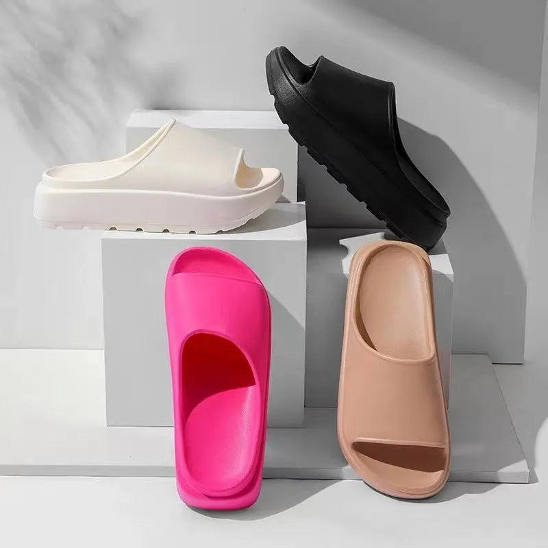 Women's thick sole fish mouth slippers in beige colour, showing the elevated EVA outsole.