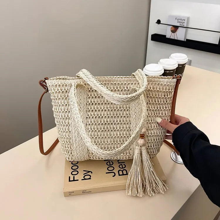 Women's woven straw crossbody bag in milky white with polyester lining and shoulder strap