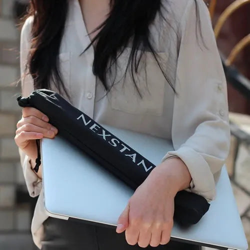 Black foldable portable laptop stand with lifting mechanism, shown with carrying case
