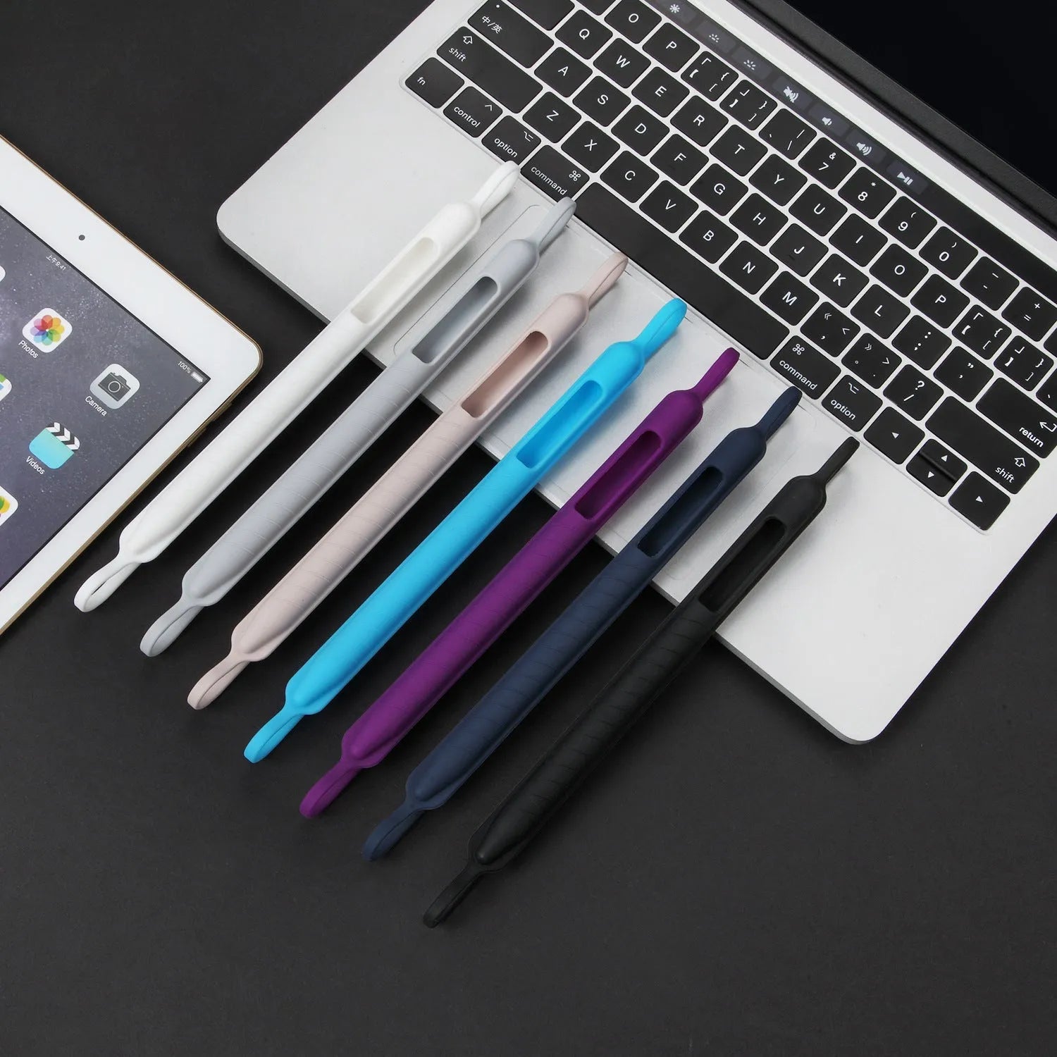 Silicone snap on pen case for Apple Pencil 1st and 2nd generation in black, gray, and white