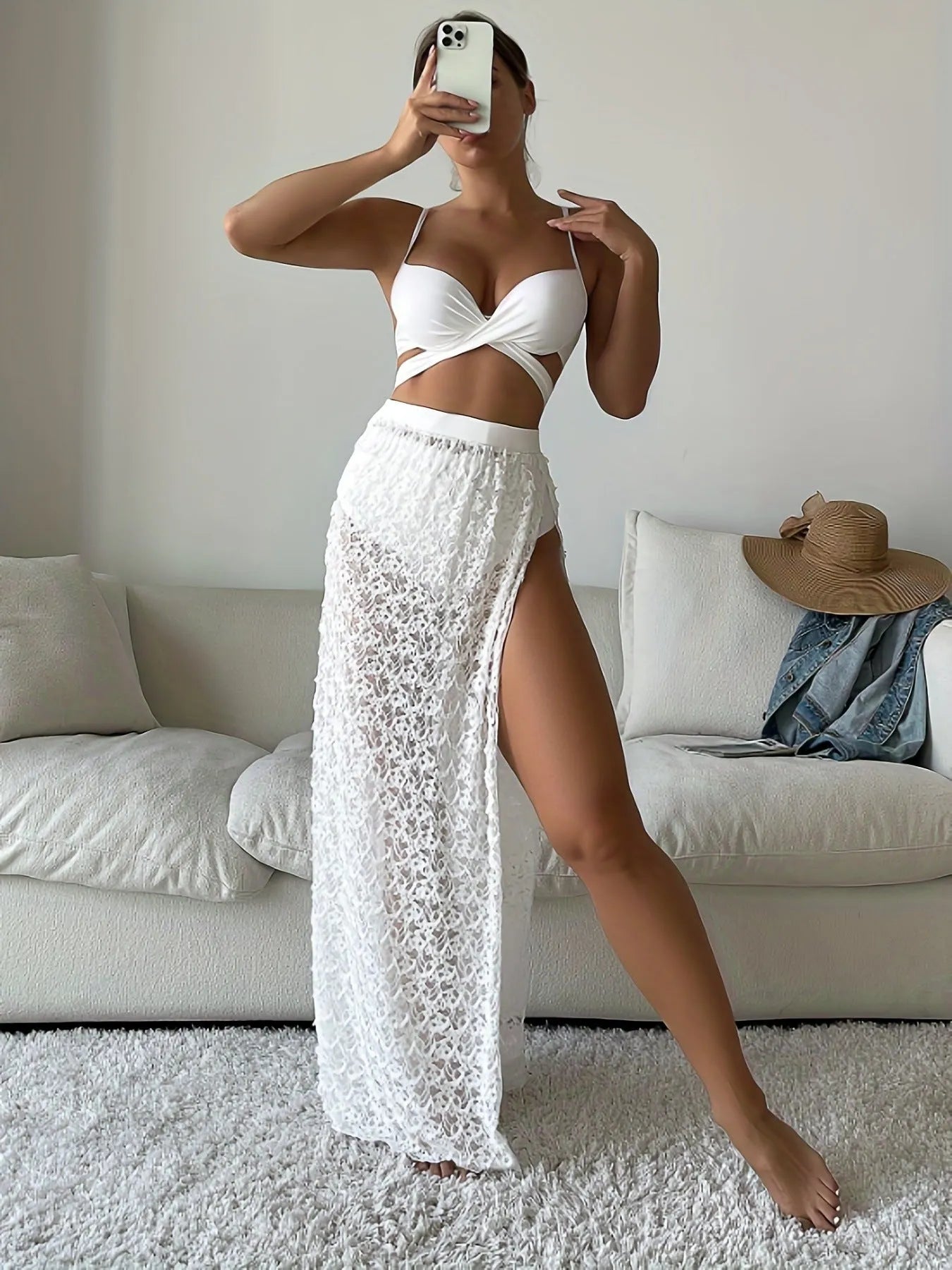 White three-piece nylon swimsuit set with a gathered long skirt, shown on a model for swimming.