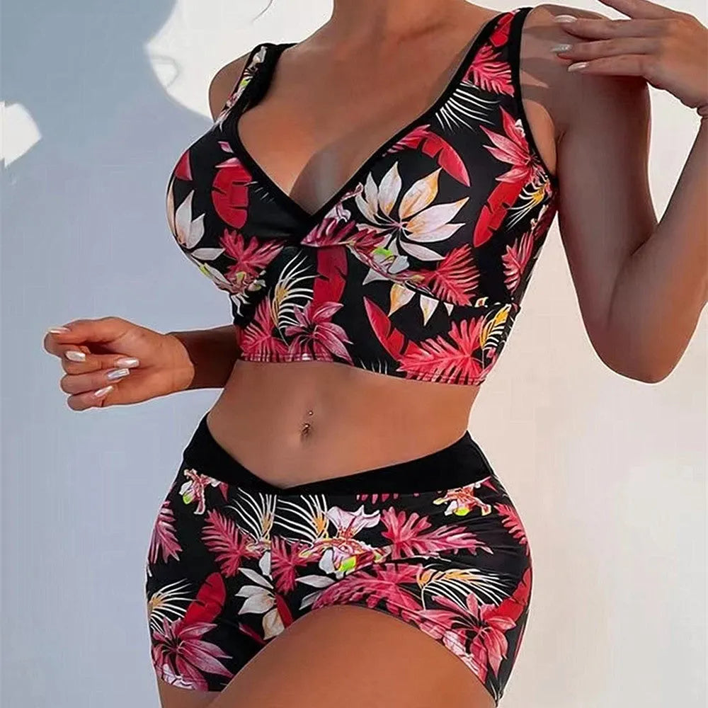Women's two-piece swimsuit with printed boxer briefs and sleeveless top in multiple colours.