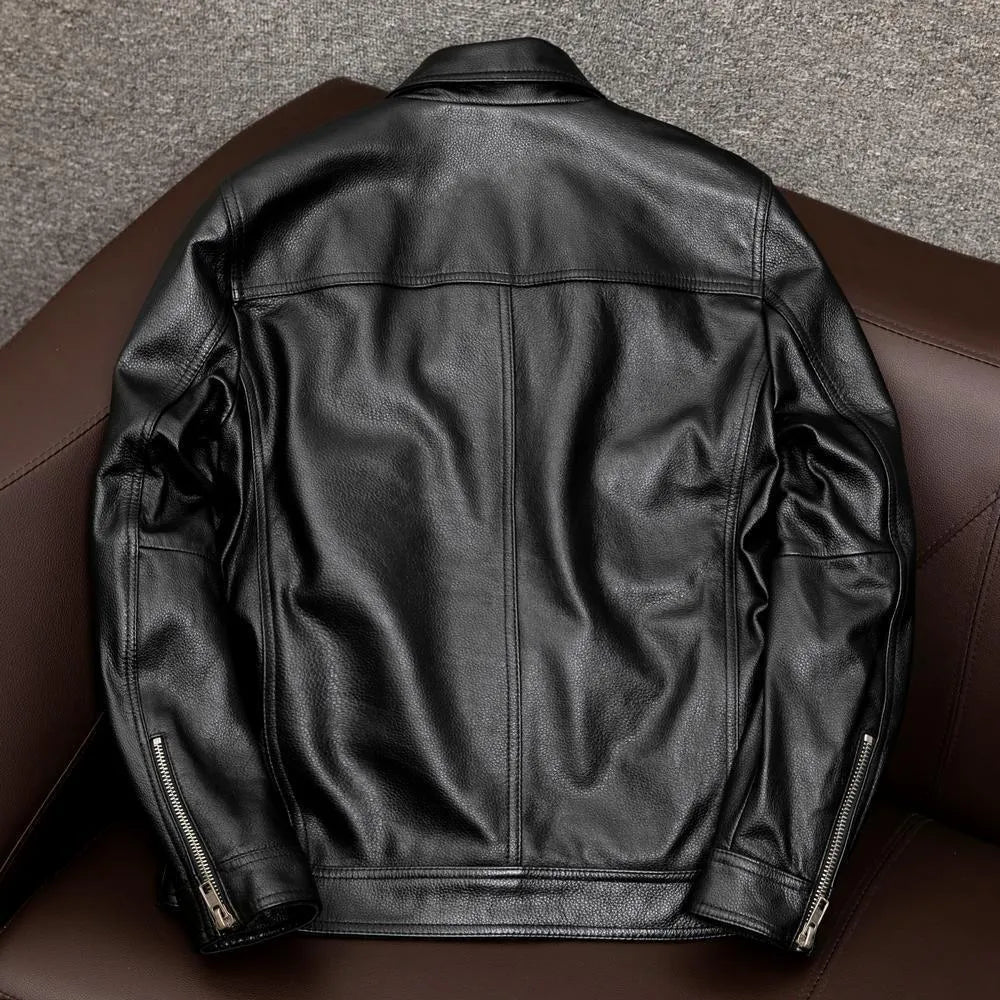 A man's black lapel short leather jacket with side pockets, shown in a loose fit.