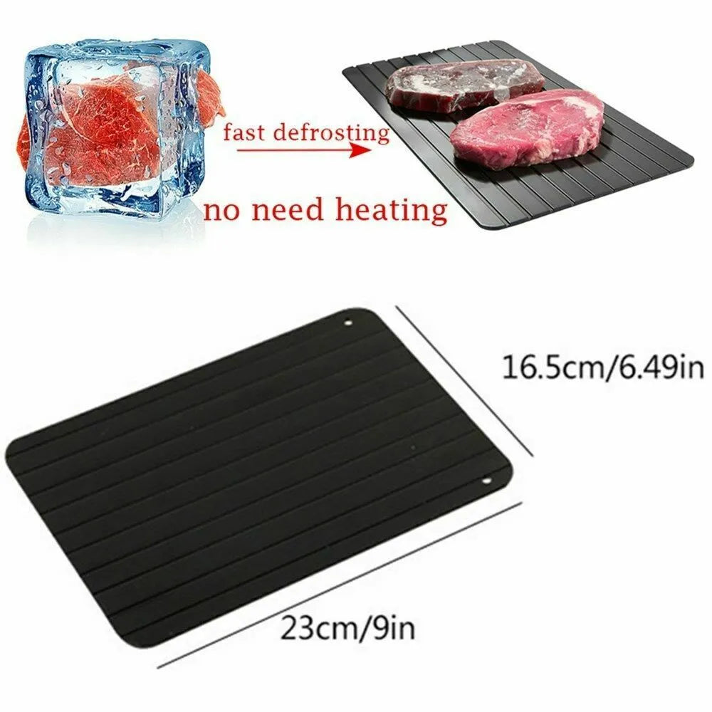 Black aluminium fast defrosting tray for thawing frozen meat and food.