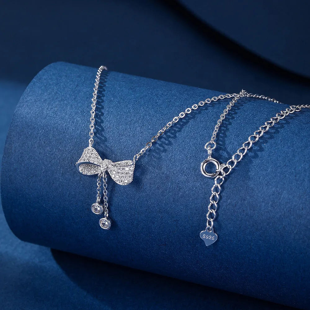 S925 sterling silver bow pendant necklace on O-ring chain with adjustable 40-45cm length