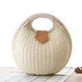 Rattan handbag in round woven straw style with hard shell and inner pocket