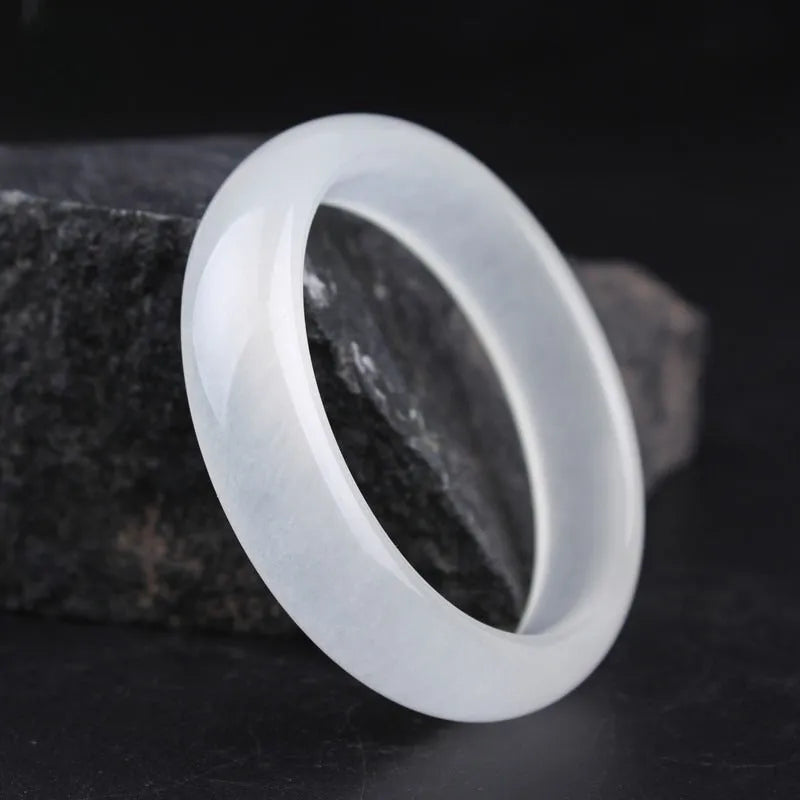 Gao Bing ice-like white moonlight jade bracelet showing flat rod and round rod style options on a wrist.