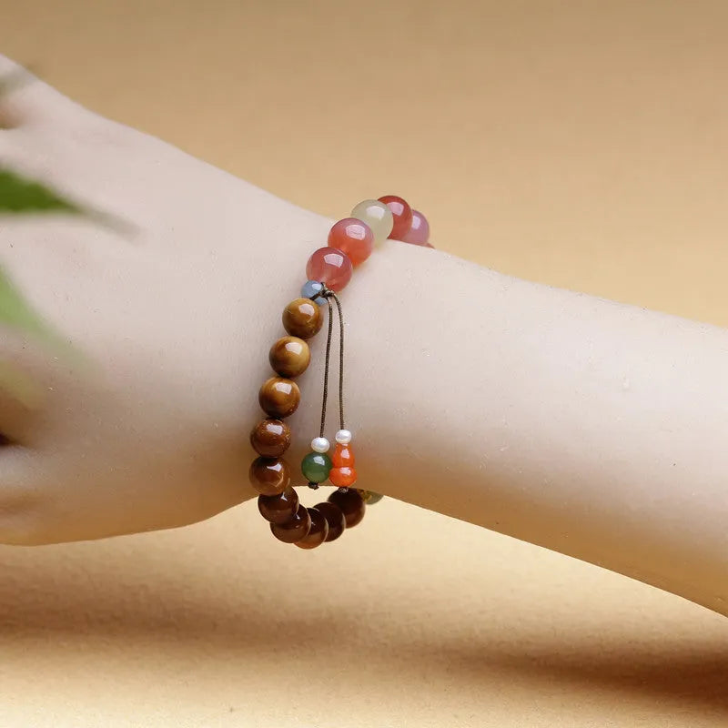 Handmade 8mm agate bracelet with diamond-shaped persimmon elements