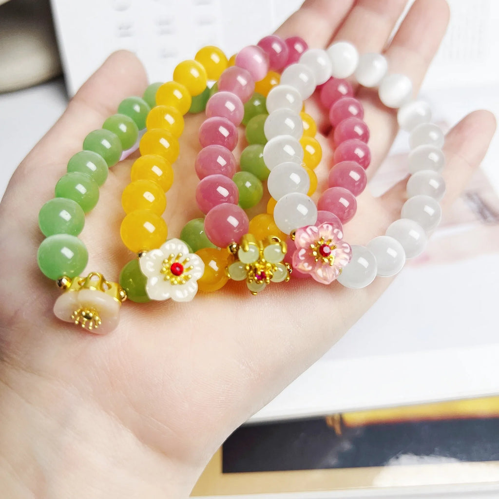 Handmade floral glass bead bracelet women's jewellery in yellow, pink, white or green colour options