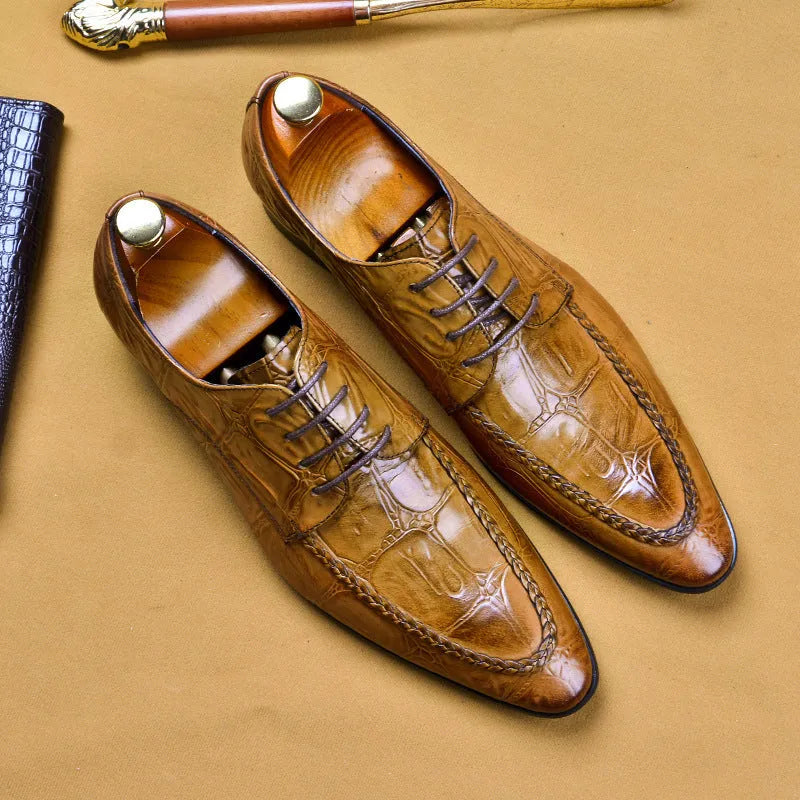 Men's black leather shoes with alligator pattern texture and horse bit buckle detail