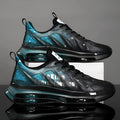 Men's black and green heightened casual shoes with a platform sole and mesh upper.