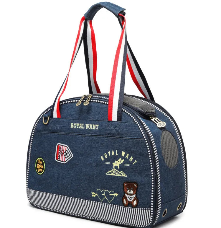 Blue denim pet diaper bag with cartoon pattern measuring 43x20x30cm