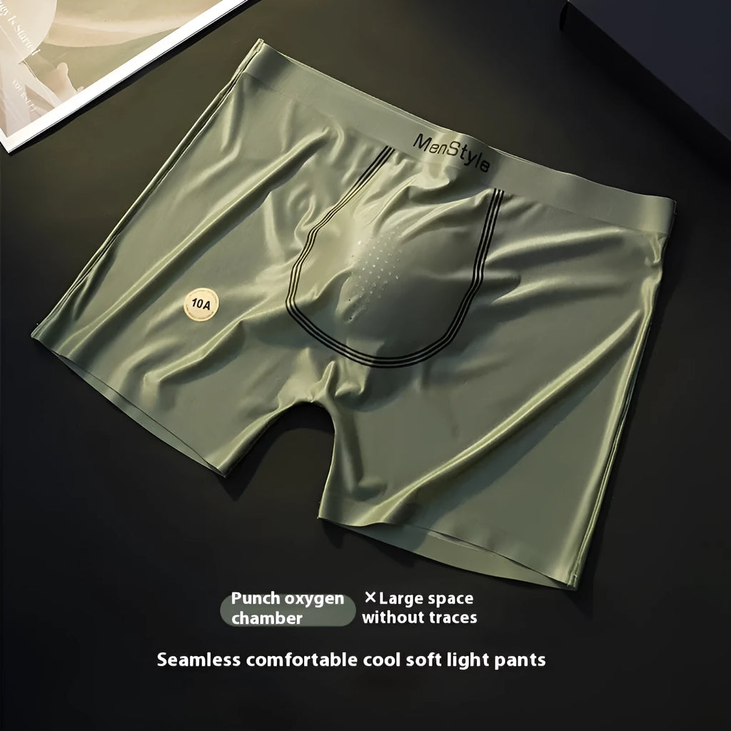 Men's seamless satin ice silk nylon boxer shorts in mid-waist style, shown in flesh colour
