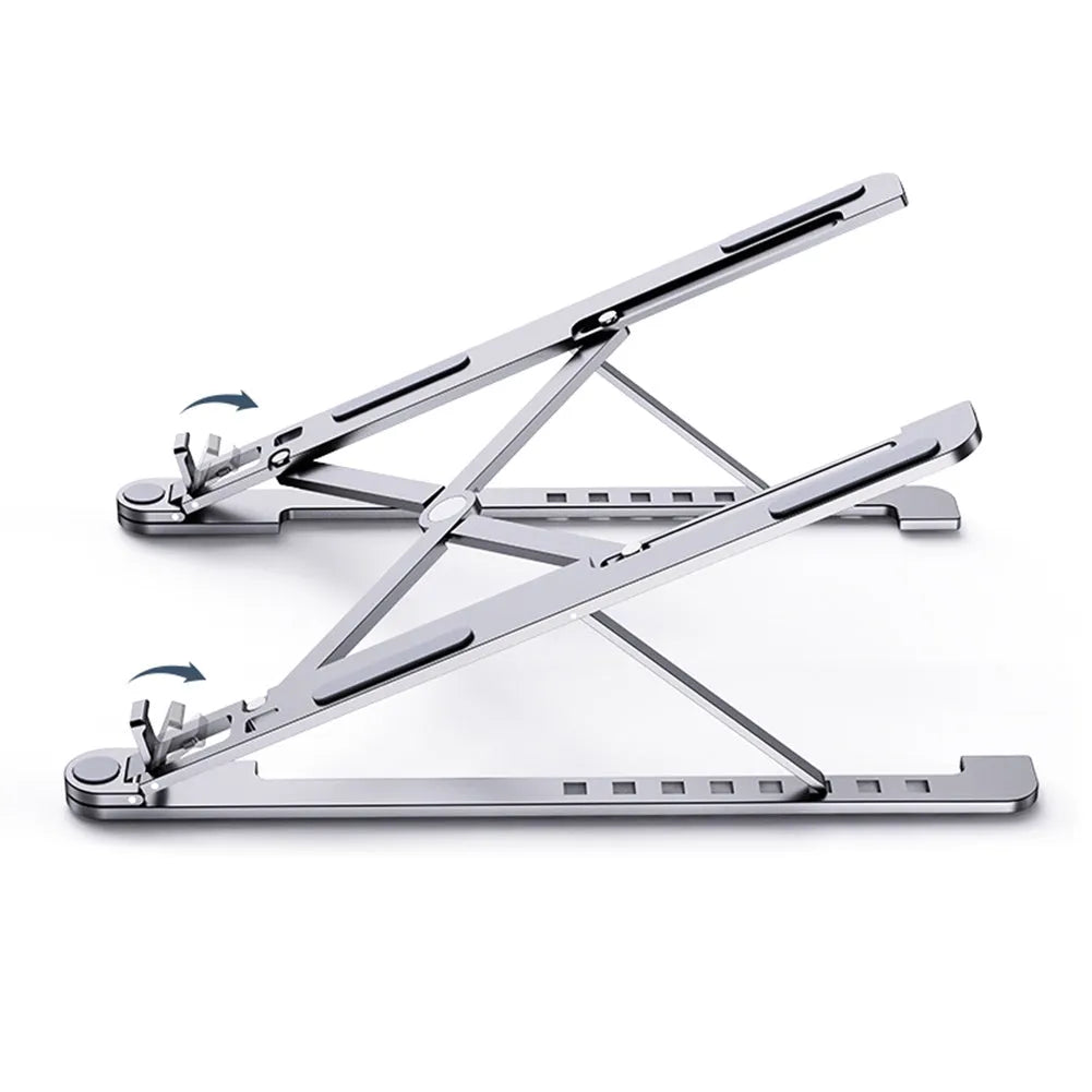 Foldable aluminium laptop stand in silver, shown supporting a laptop at an angle.